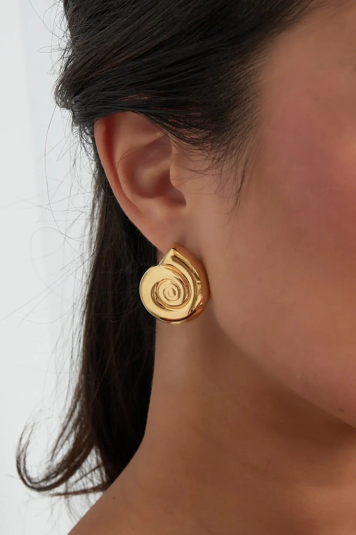 Oorbellen Swirly Shell Goud